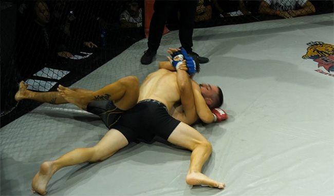 manos nikitas mma quest 10